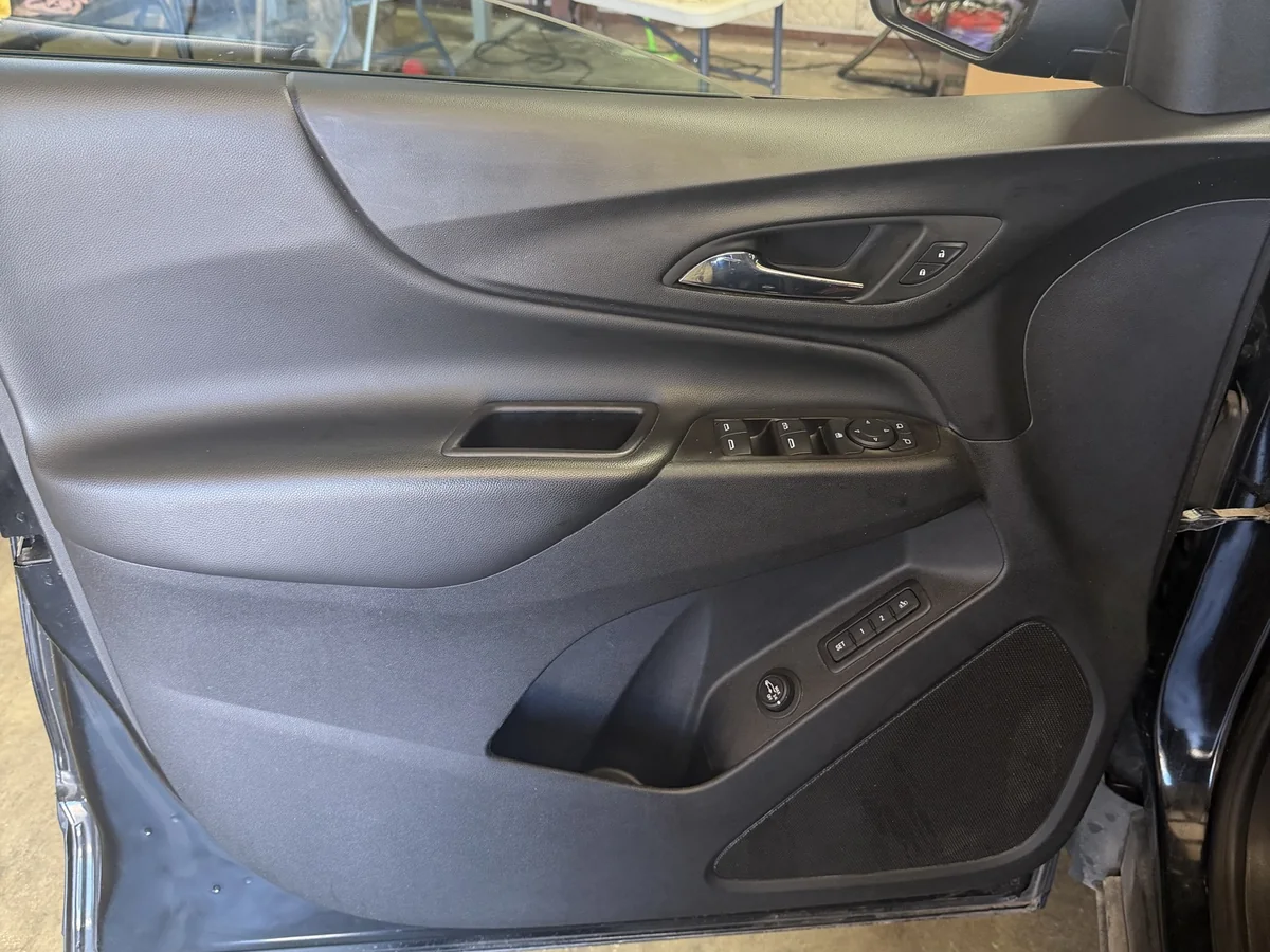 Cleaned and dressed front door panel on a Chevrolet Equinox