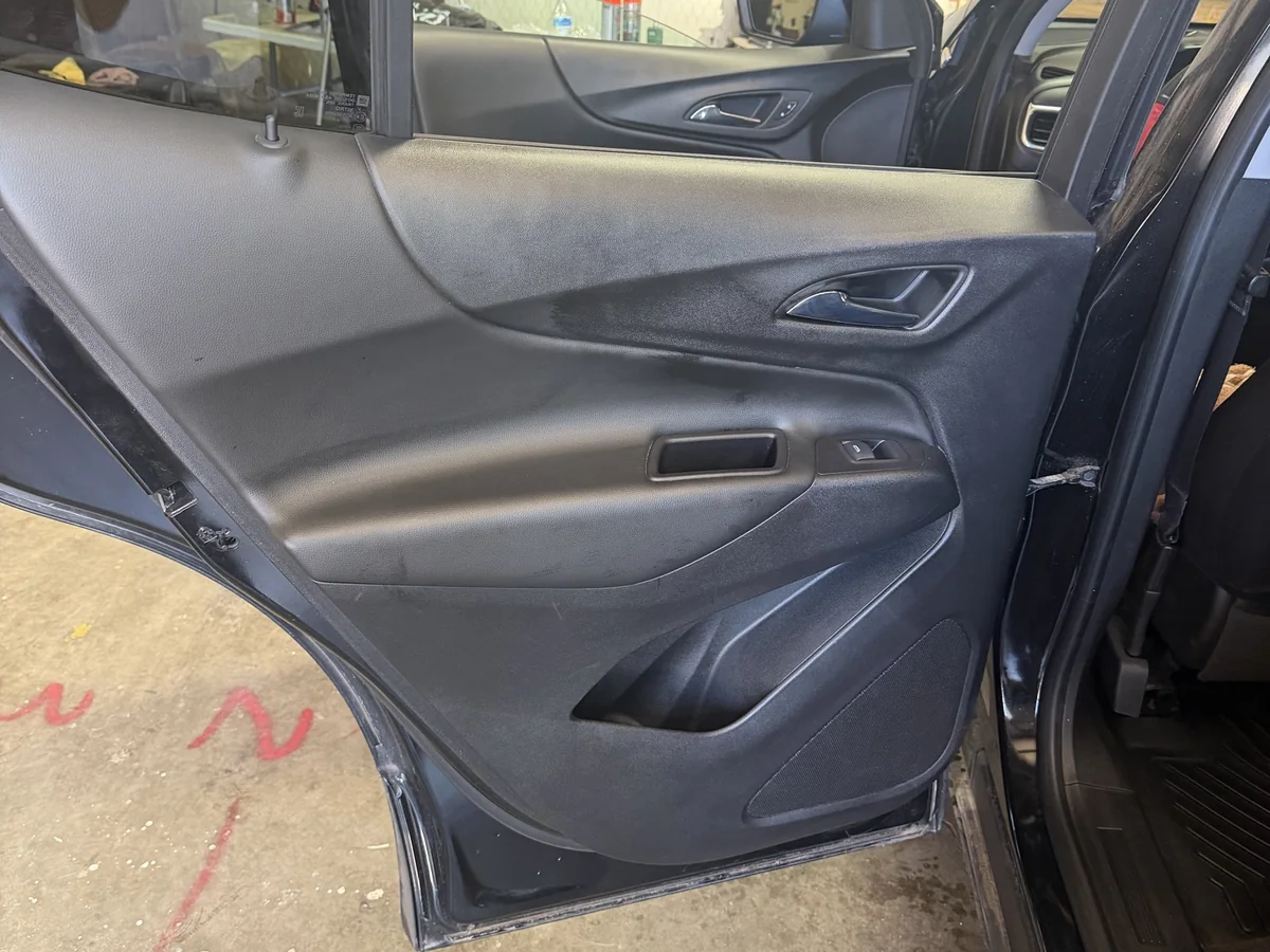 Cleaned rear door panel and interior trim on a Chevrolet Equinox