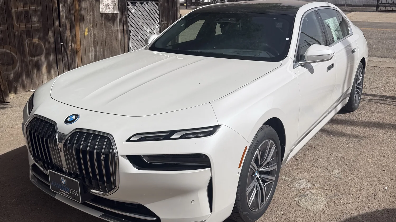 Freshly detailed white BMW 7 Series with a mirror-gloss finish at Alley Oops Detailing